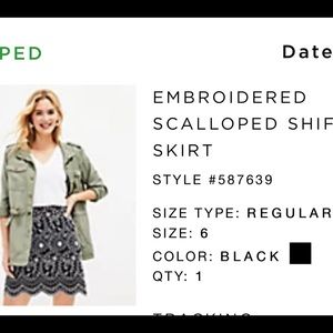 Black and white embroidered mini skirt